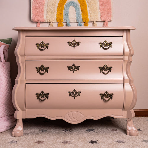 set of drawers painted in pink gloss paint