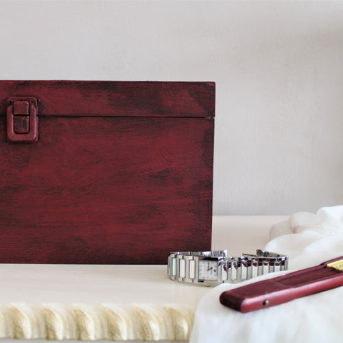 jewellery box painted in red chalk paint and finished with dark wax